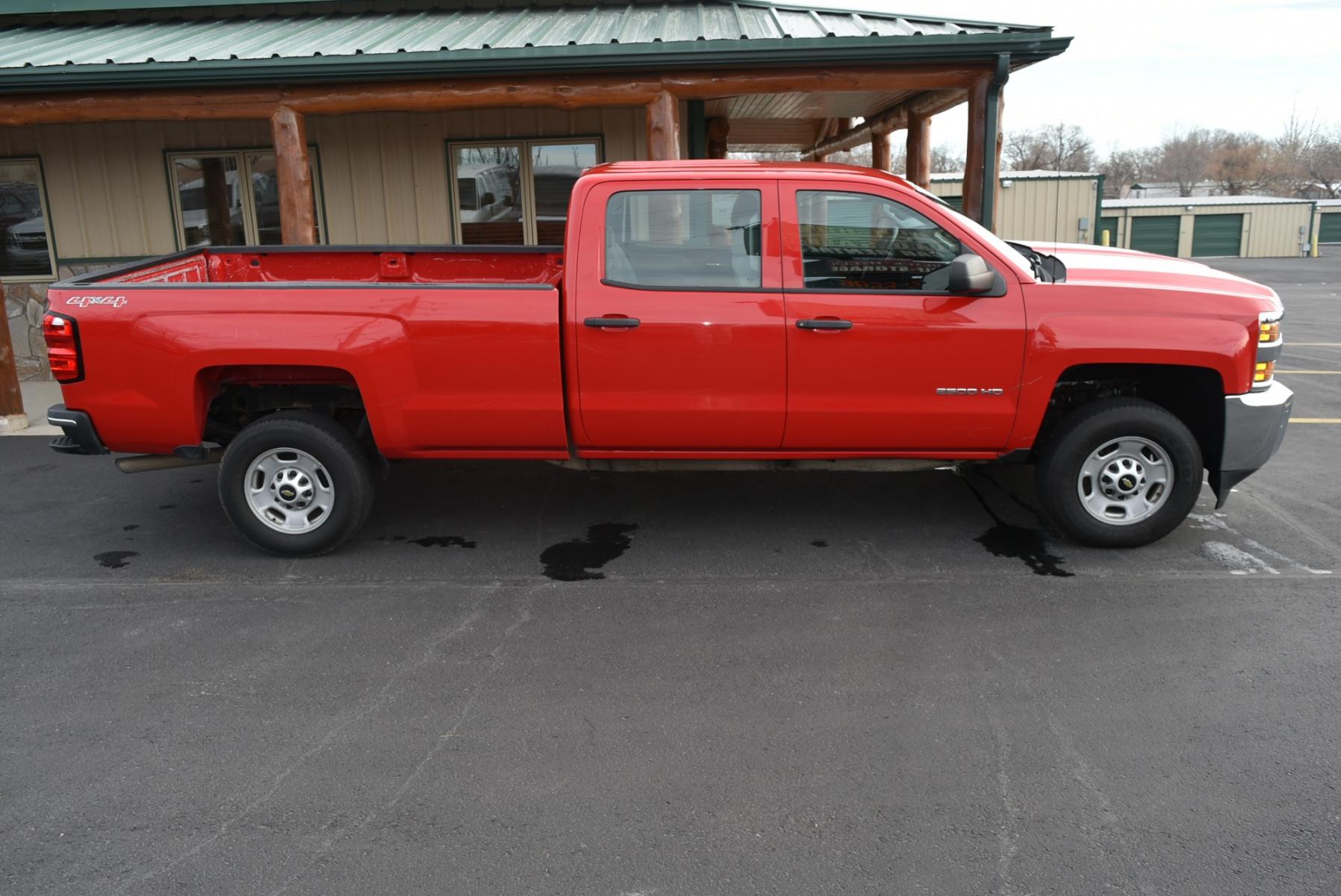 2015 Red /Gray Chevrolet Silverado 2500 HD (1GC1KUEG2FF) with an 6.0L Vortec V8 Varaible Valve Timing SFI engine, 6-Speed Automatic Heavy-Duty, Electronically Controlled transmission, located at 1600 E Hwy 44, Rapid City, SD, 57703, (605) 716-7878, 44.070232, -103.171410 - Photo #4